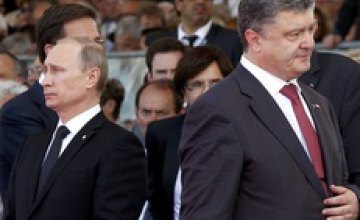 Петр Порошенко и Владимир Путин поговорили о прекращении огня на востоке Украины