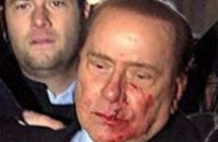 Берлускони получил по лицу
