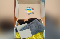 «Тепла» посилка на передову: мешканці Девладівської громади передали захисникам понад 800 пар шкарпеток
