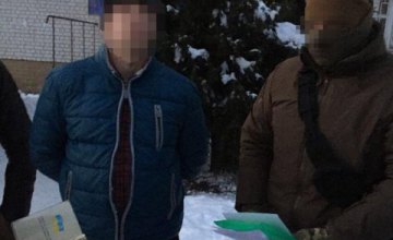 На Киевщине майор полиции задержан при получении 5 тыс. грн взятки