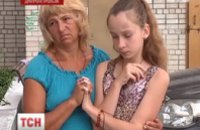 В Днепропетровске стаффордширский терьер загрыз маленького шпица на руках у ребенка